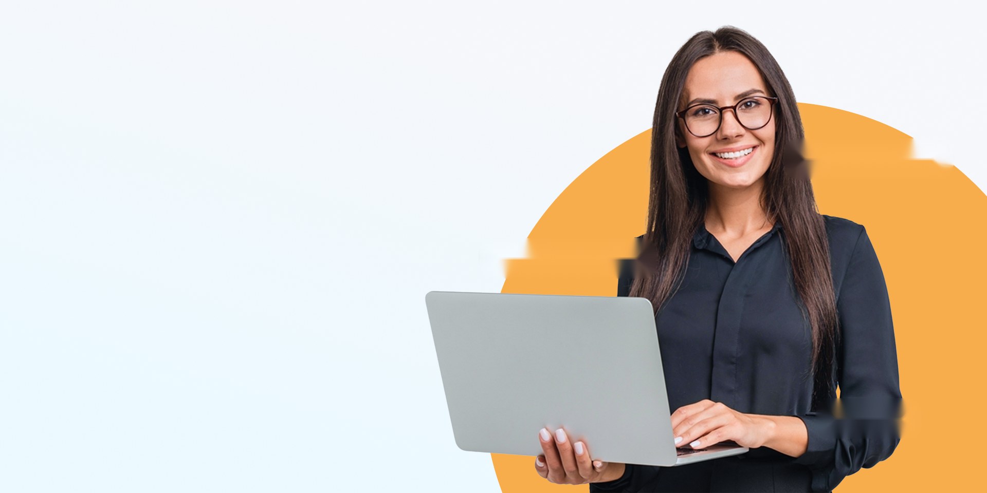 Medicare agent smiling and holding a laptop